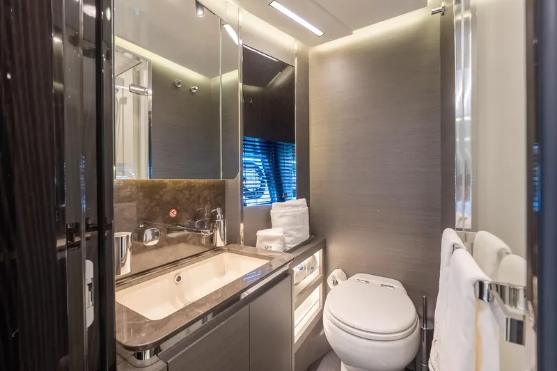 Slide: The Image of Luxurious bathroom in 2023 Azimut S8 yacht with modern fixtures and elegant design. - 55