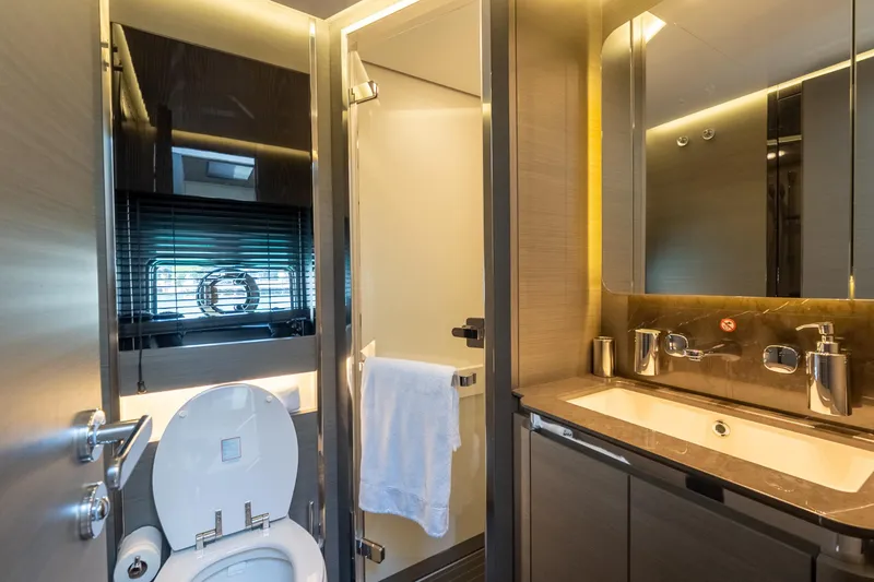 Slide: The Image of Luxurious bathroom in 2023 Azimut S8 yacht with modern fixtures and elegant design. - 59
