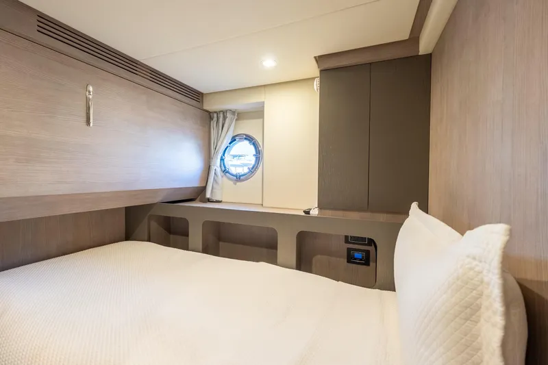 Slide: The Image of Luxurious cabin interior of 2023 Azimut S8 yacht with modern wood finishes. - 60