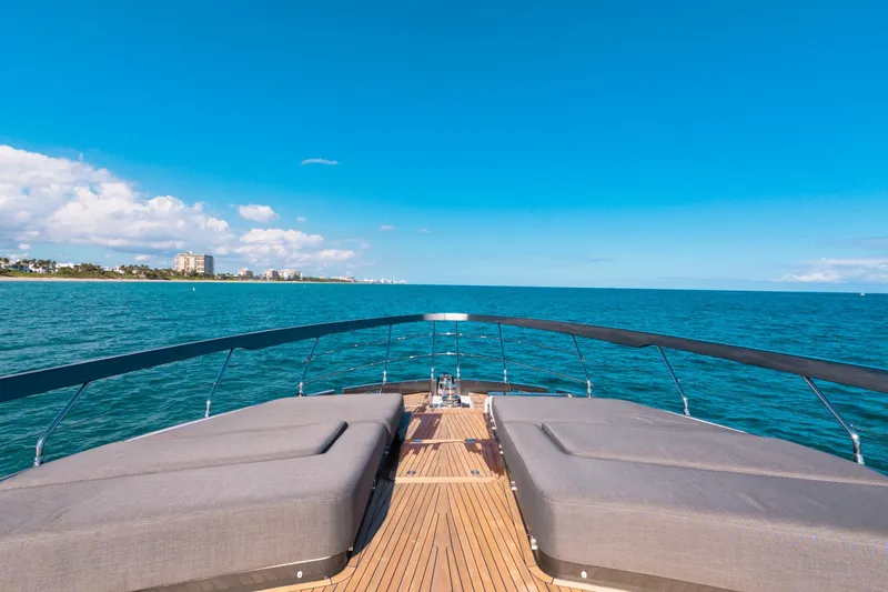 Slide: The Image of Luxurious 2023 Azimut S8 yacht deck with ocean view and clear blue sky. - 61