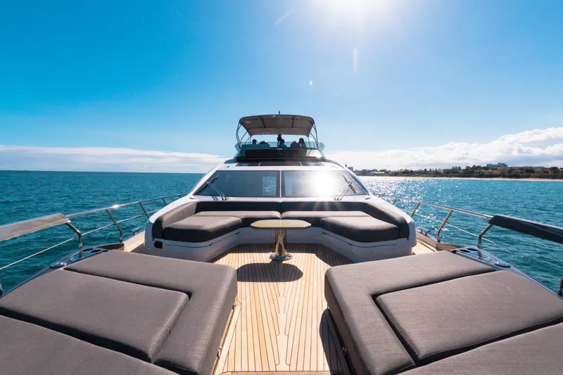 Slide: The Image of Luxurious 2023 Azimut S8 yacht deck with sun loungers and ocean view. - 64