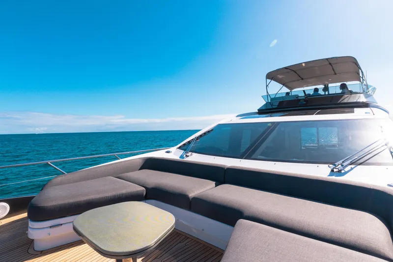 Slide: The Image of Luxurious 2023 Azimut S8 yacht on open sea with spacious deck seating. - 65