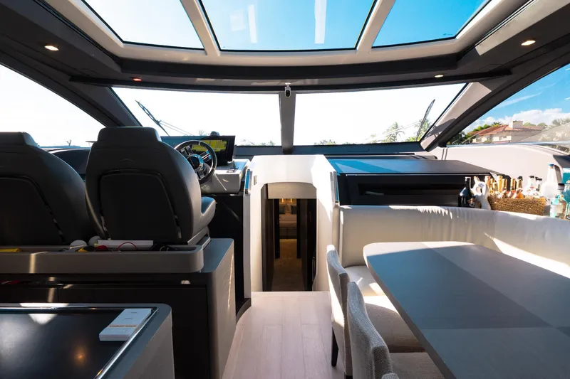 Slide: The Image of Interior of 2023 Azimut S8 yacht with modern cockpit and seating area. - 68