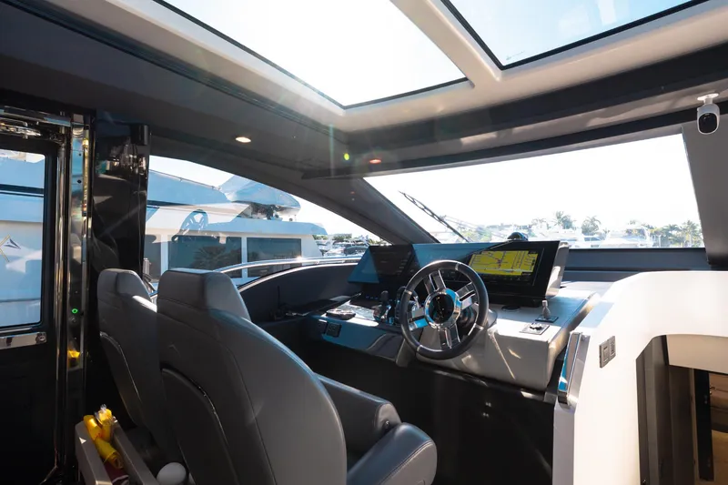 Slide: The Image of Interior cockpit of 2023 Azimut S8 yacht with modern steering and navigation systems. - 69