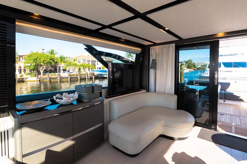 Slide: The Image of Luxurious interior of 2023 Azimut S8 yacht with modern furnishings and waterfront view. - 70