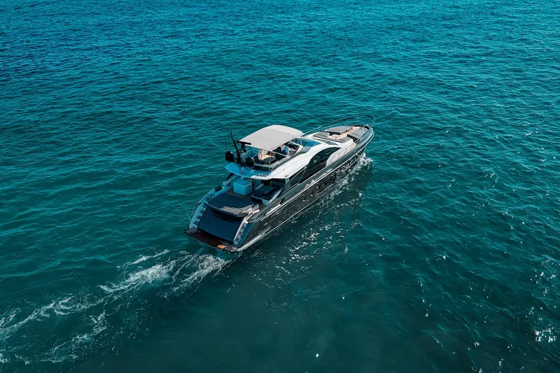 Slide: The Image of 2023 Azimut S8 yacht cruising on open blue sea. - 77