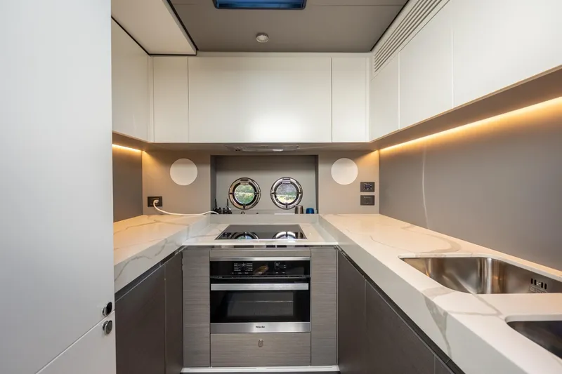 Slide: The Image of Modern kitchen interior on 2023 Azimut S8 yacht with sleek design and luxury finishes. - 88