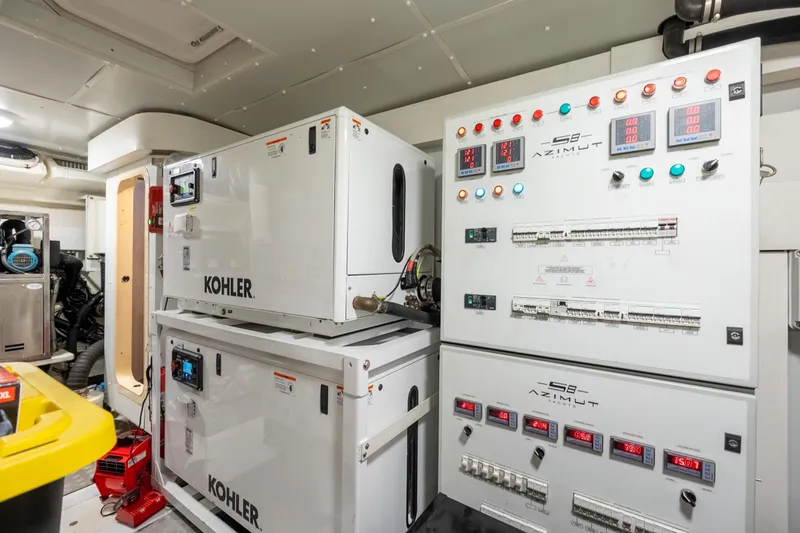 Slide: The Image of Engine room of 2023 Azimut S8 yacht with Kohler generators and control panels. - 90