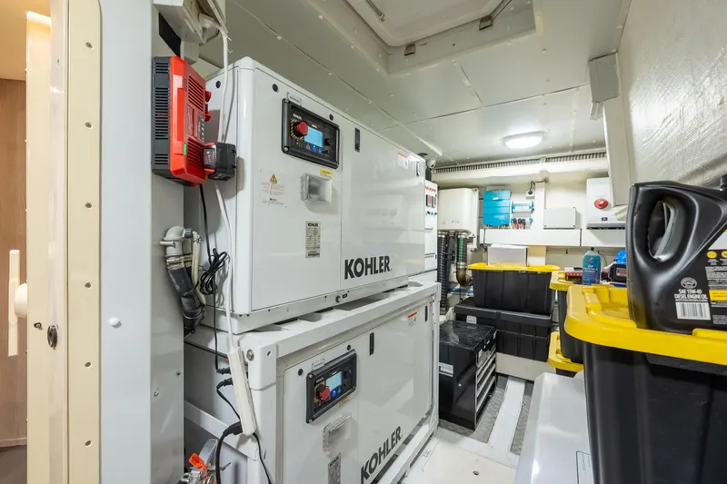 Slide: The Image of Engine room of 2023 Azimut S8 yacht with Kohler generators and storage containers. - 91