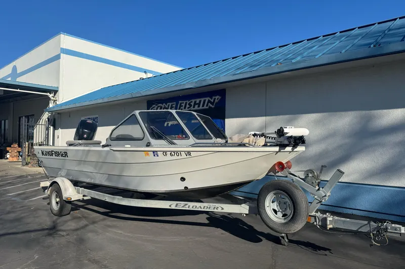 Slide: The Image of 2018 KingFisher 1825 Falcon boat on trailer outside a building. - 5
