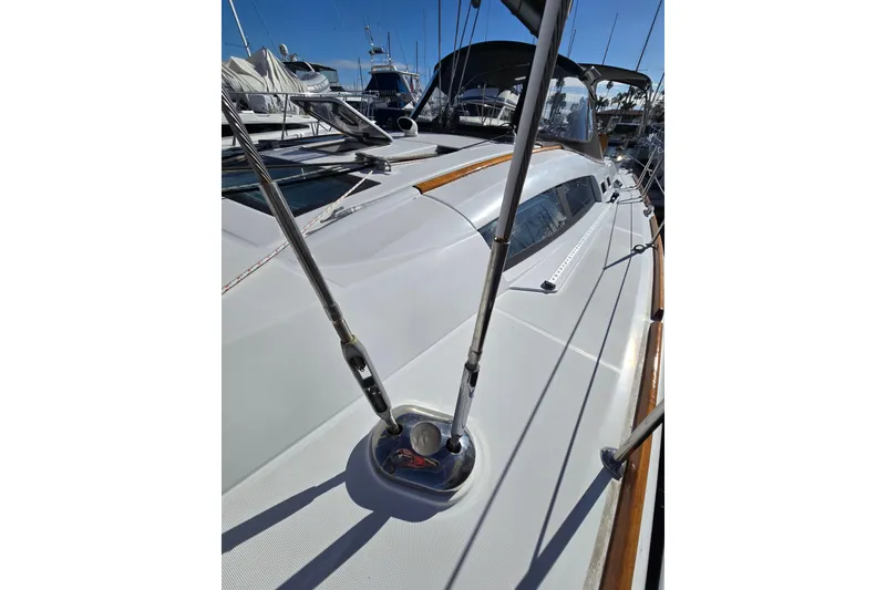 Slide: The Image of 2008 Beneteau Oceanis 49 sailboat deck with rigging, docked in marina. - 16