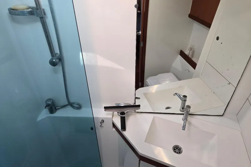 Slide: The Image of Bathroom interior of 2008 Beneteau Oceanis 49 yacht with modern fixtures. - 29