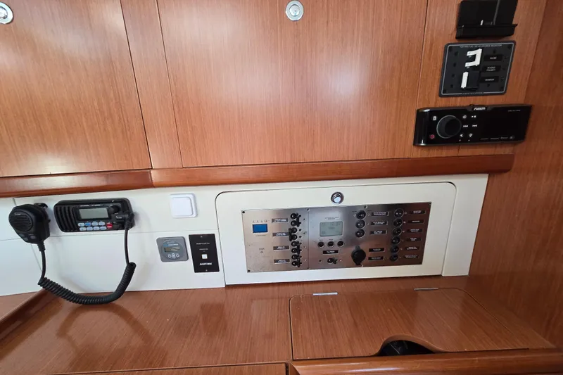 Slide: The Image of Control panel of a 2008 Beneteau Oceanis 49 yacht with communication equipment. - 37