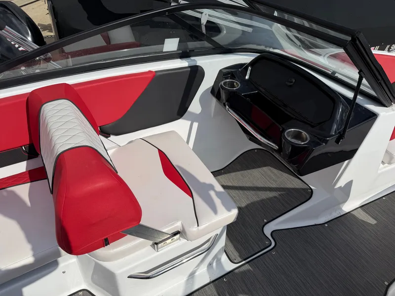 Slide: The Image of Interior of a 2022 Glastron 210 GX with red and white seating. - 15