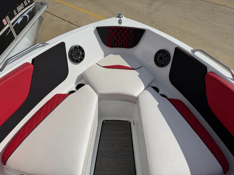 Slide: The Image of Interior of 2022 Glastron 210 GX boat with red and black seating. - 19