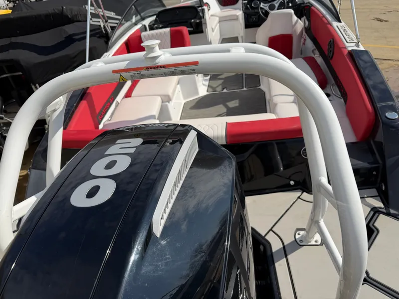 Slide: The Image of 2022 Glastron 210 GX boat with 200 HP engine, interior view. - 5