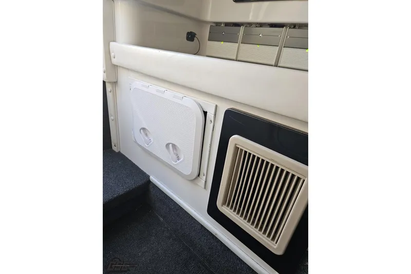 Slide: The Image of Interior view of a 2007 Donzi 38 ZR boat, featuring a speaker and vent. - 109