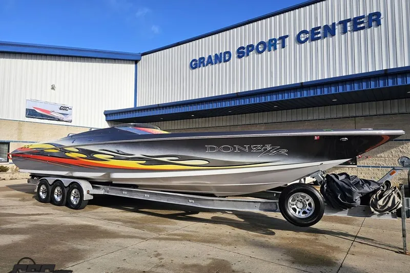 Slide: The Image of 2007 Donzi 38 ZR speedboat on trailer at Grand Sport Center. - 12