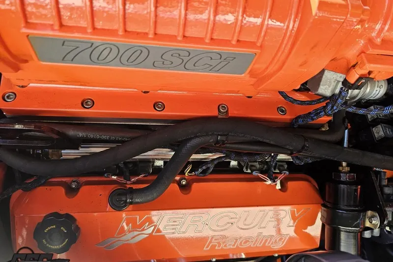 Slide: The Image of Close-up of a 2007 Donzi 38 ZR engine featuring Mercury Racing 700 SCI components. - 127