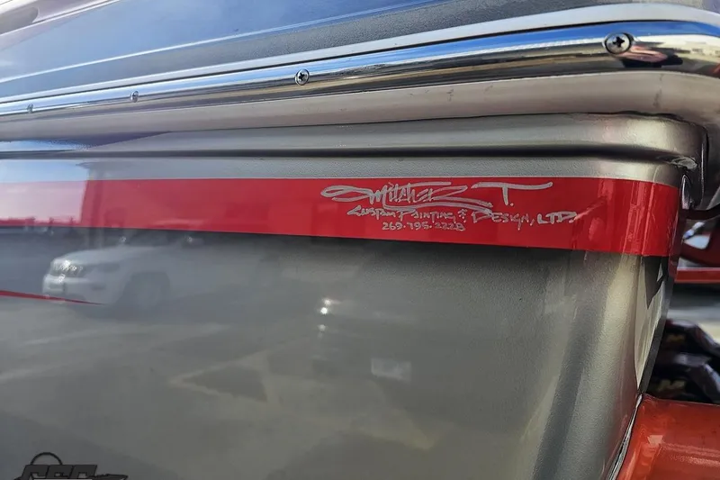 Slide: The Image of 2007 Donzi 38 ZR boat detail with custom paint and design signature. - 26