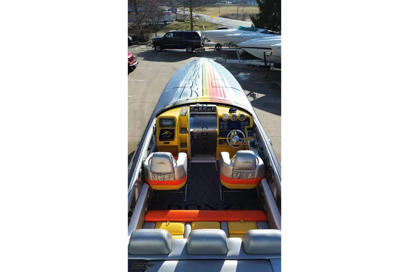 Slide: The Image of 2007 Donzi 38 ZR speedboat with vibrant interior and sleek design. - 44