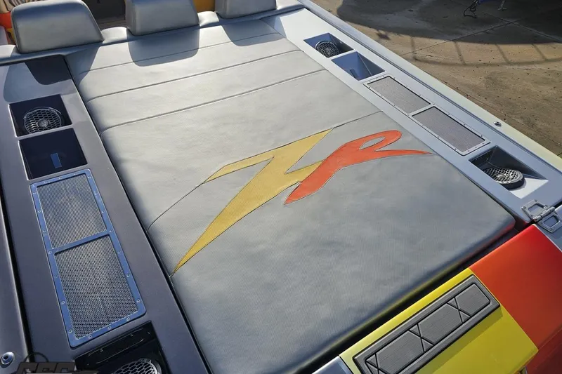 Slide: The Image of 2007 Donzi 38 ZR boat interior with custom upholstery and vibrant design elements. - 56