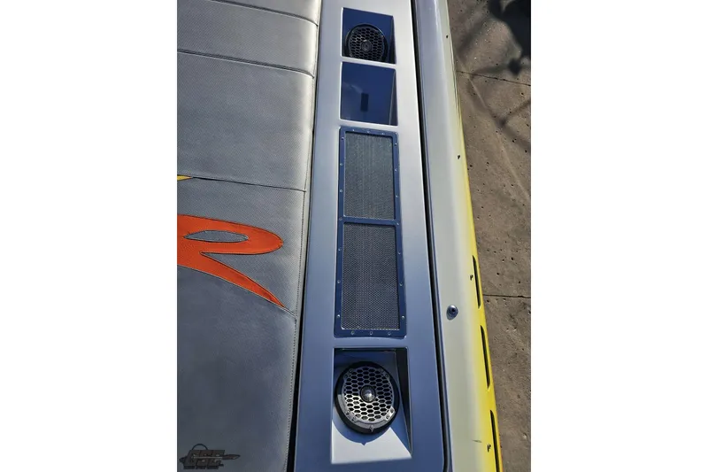 Slide: The Image of 2007 Donzi 38 ZR boat deck with speakers and stylish design elements. - 64