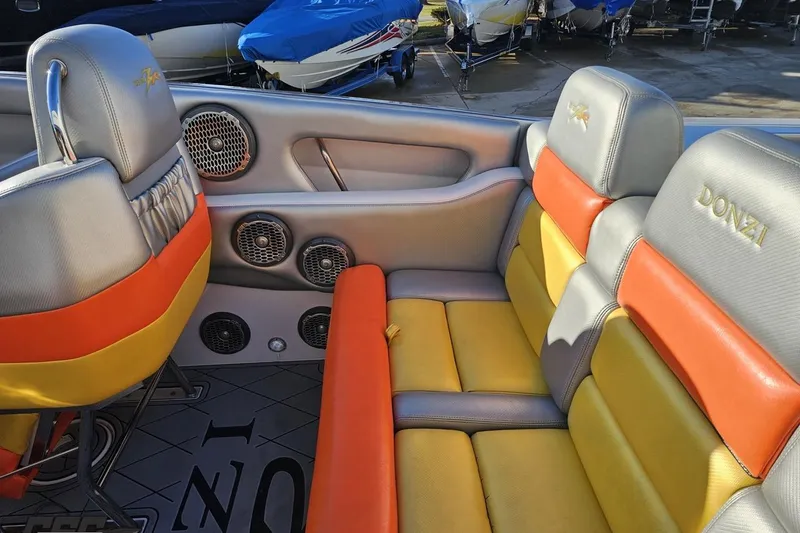 Slide: The Image of 2007 Donzi 38 ZR boat interior with colorful seating and audio speakers. - 71