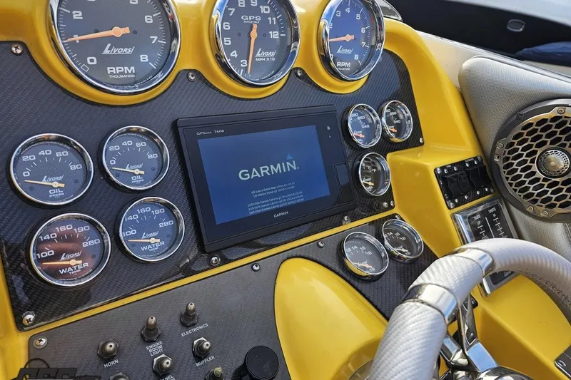 Slide: The Image of Dashboard of a 2007 Donzi 38 ZR boat with Garmin GPS and Livorsi gauges. - 80