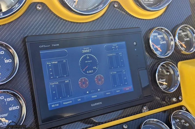 Slide: The Image of Dashboard of a 2007 Donzi 38 ZR with Garmin GPS and analog gauges. - 85