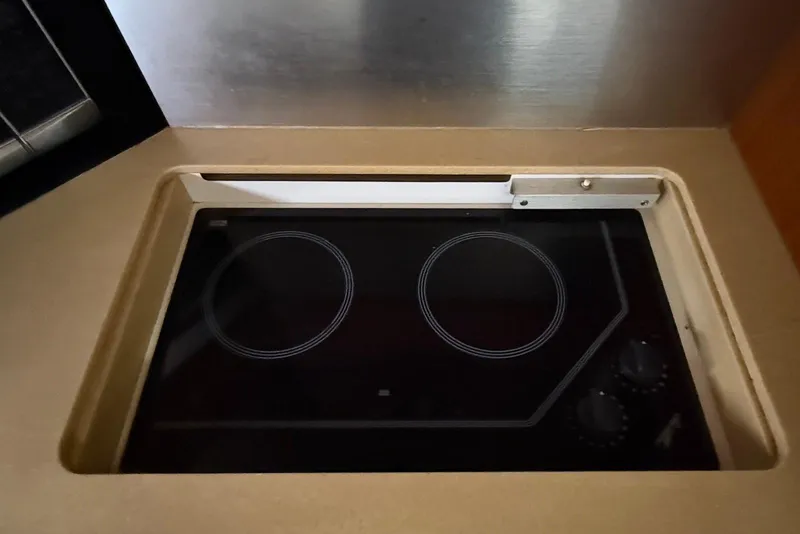 Slide: The Image of Built-in stovetop on 2004 Tiara Yachts 3600 Sovran, featuring two burners. - 41