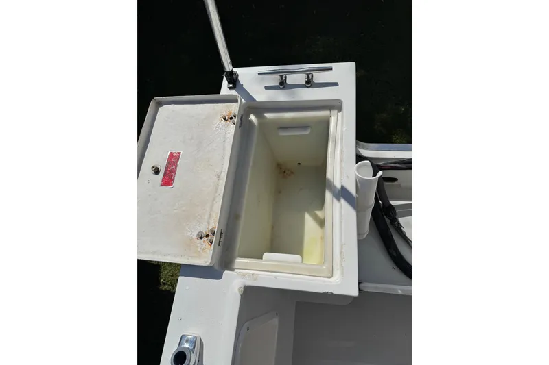 Slide: The Image of Open storage compartment on 1988 Chris-Craft 215 Sea Hawk boat. - 34