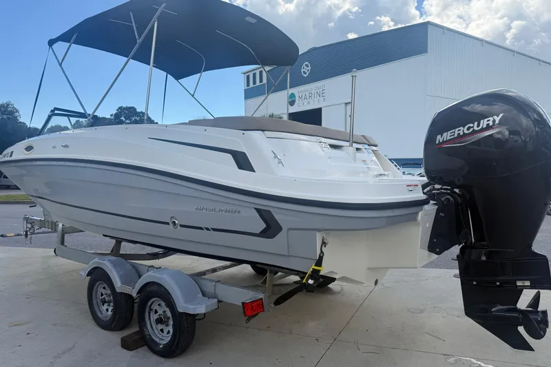 Slide: The Image of 2022 Bayliner VR6 Bowrider OB with Mercury outboard engine on trailer. - 10