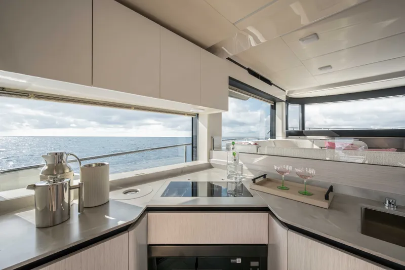 Slide: The Image of Luxurious kitchen interior of 2027 Absolute 50 Navetta yacht with ocean view. - 26