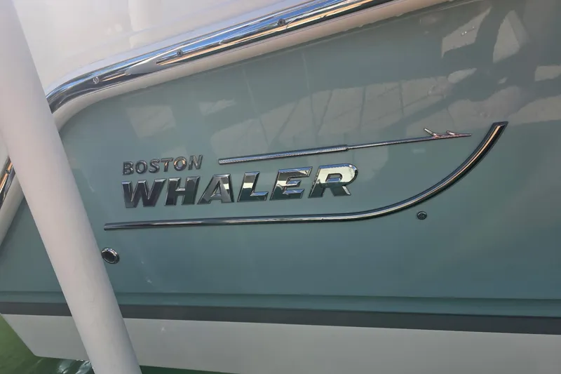 Slide: The Image of 2021 Boston Whaler 240 Vantage boat logo on hull. - 29