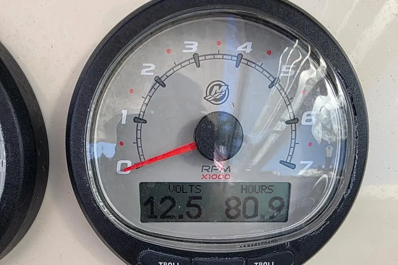 Slide: The Image of Tachometer display on 2021 Boston Whaler 240 Vantage showing 12.5 volts and 80.9 hours. - 36