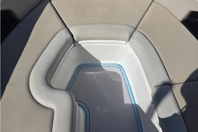 Slide: The Image of Interior seating of 2021 Boston Whaler 240 Vantage boat, featuring cushioned upholstery. - 44