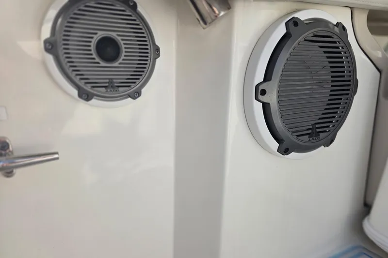 Slide: The Image of Speakers on a 2021 Boston Whaler 240 Vantage boat interior. - 45