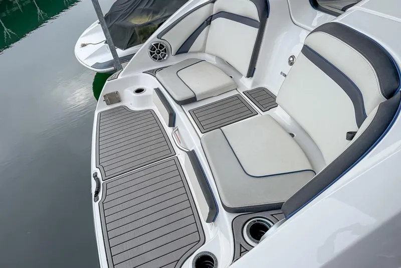 Slide: The Image of 2019 Yamaha Boats 242 Limited S E-Series swim platform with cushioned seating and cup holders. - 16