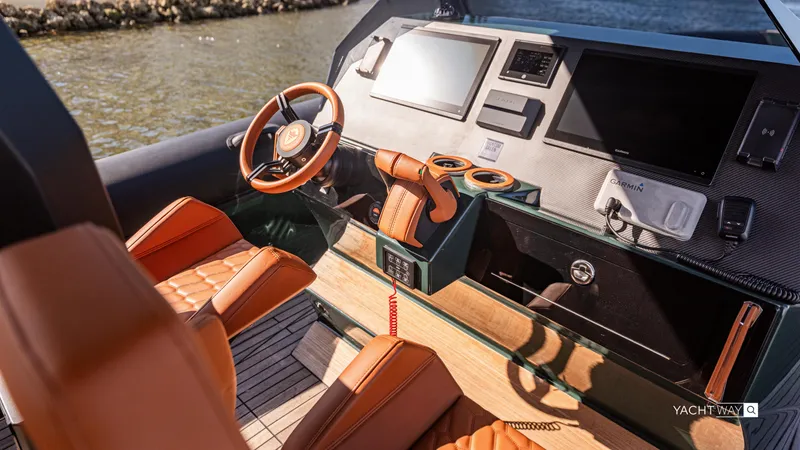 Slide: The Image of Luxurious 2025 Skipper-BSK 38 yacht cockpit with leather seats and advanced navigation systems. - 49