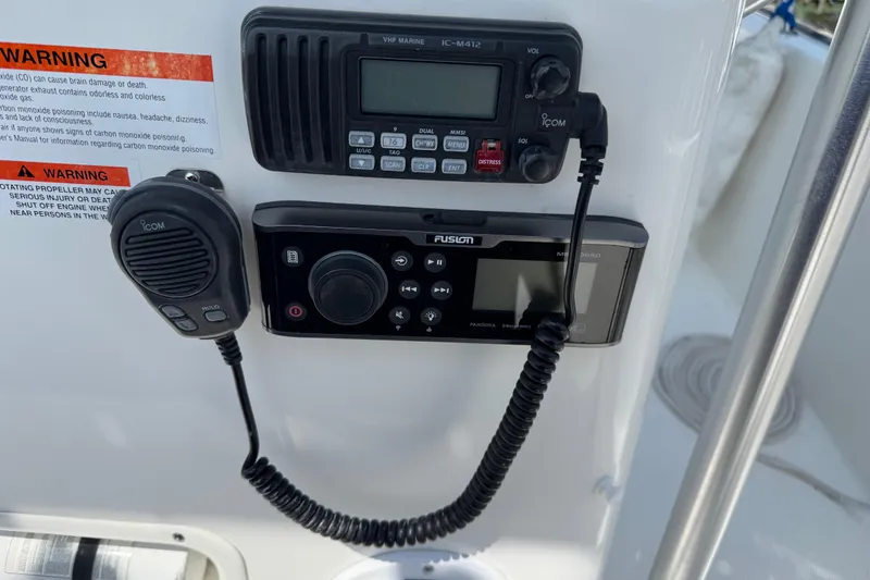 Slide: The Image of VHF marine radio and audio system on 2013 Boston Whaler 210 Montauk boat console. - 20