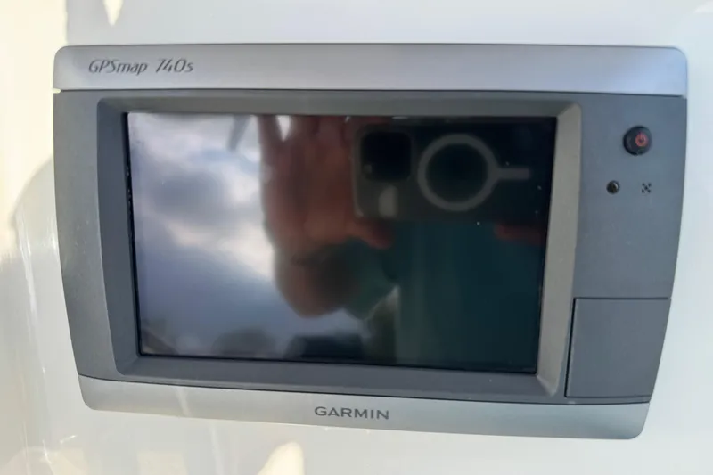Slide: The Image of Garmin GPSmap 740s on 2013 Boston Whaler 210 Montauk boat dashboard. - 29