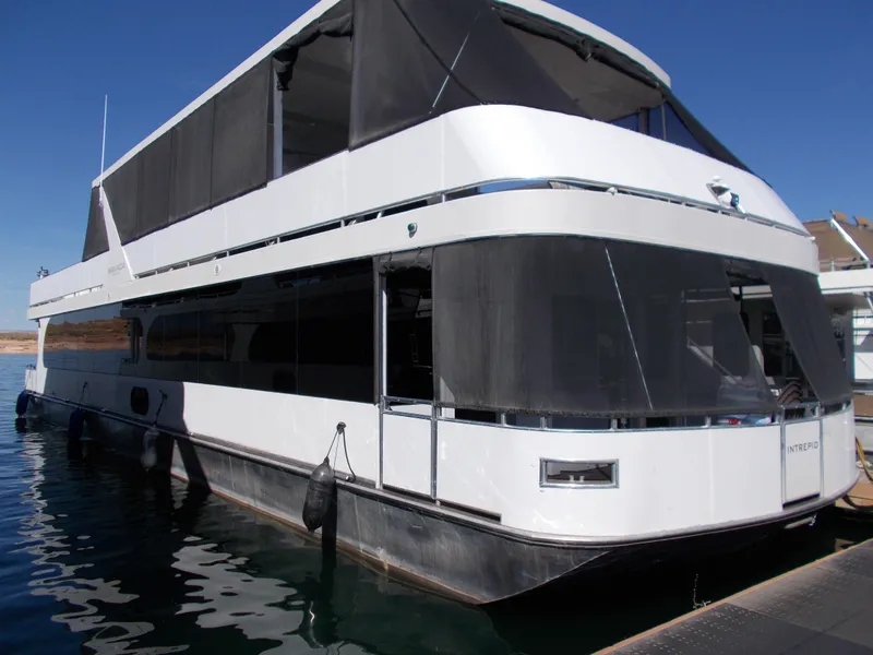Slide: The Image of Luxurious Bravada houseboat docked, 2015 model. - 2