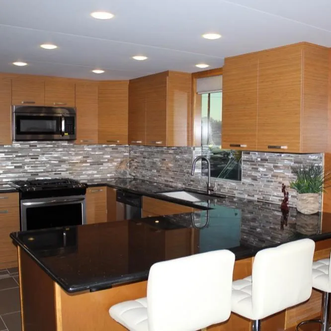 Slide: The Image of Modern kitchen with wood cabinets and granite countertop, 2015 Bravada Intrepid Trip. - 6