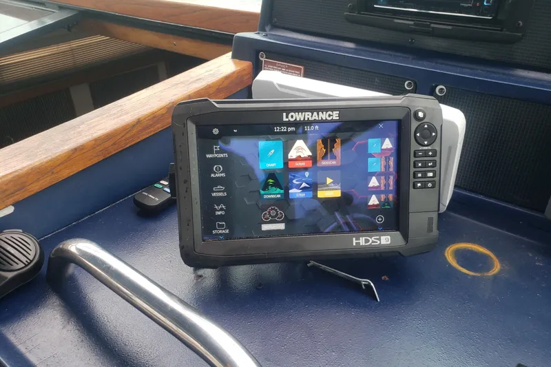 Slide: The Image of Lowrance HDS-9 marine GPS system on 1988 Sea Ray 390 Express Cruiser dashboard. - 22
