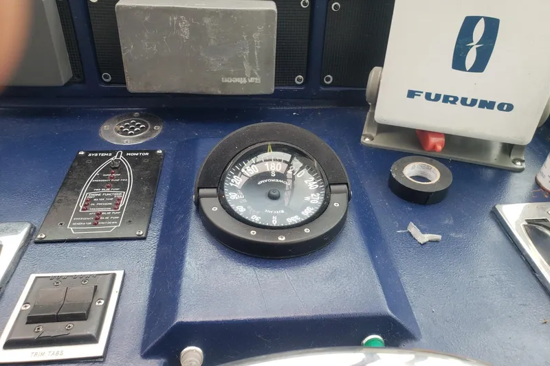 Slide: The Image of Control panel of a 1988 Sea Ray 390 Express Cruiser with Furuno equipment. - 23