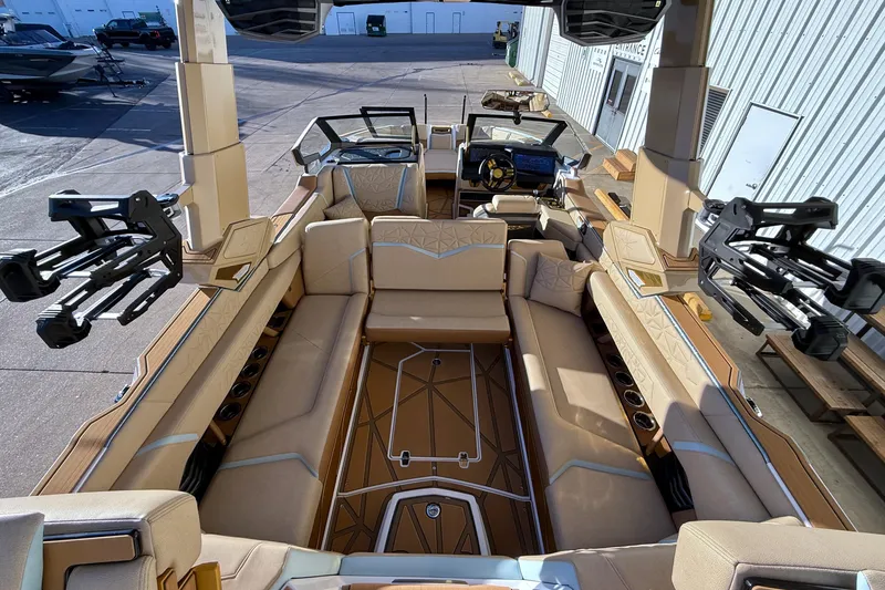 Slide: The Image of Luxurious interior of 2026 Nautique Super Air Nautique G25 Paragon boat. - 12