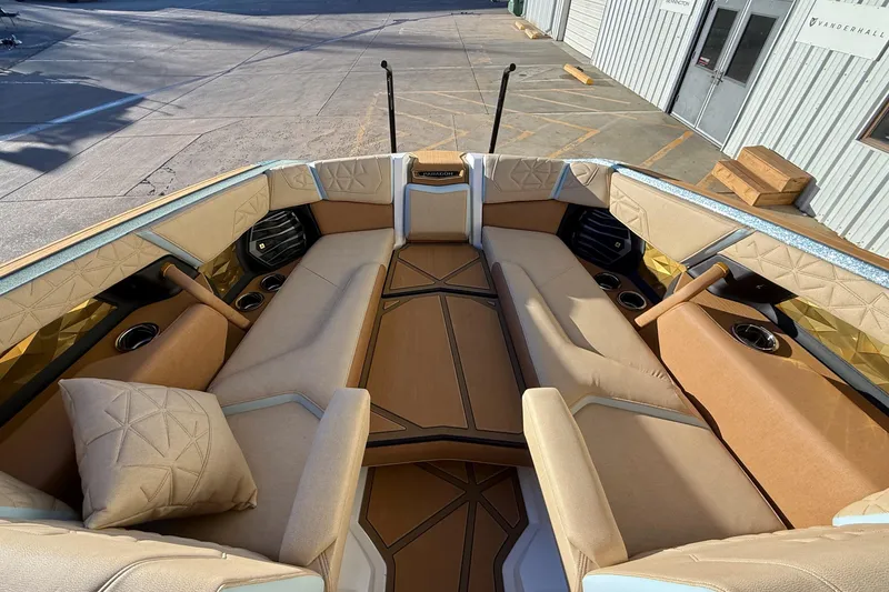Slide: The Image of Luxurious interior of 2026 Nautique Super Air Nautique G25 Paragon boat. - 14