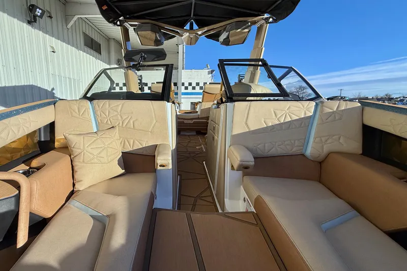 Slide: The Image of 2026 Nautique Super Air Nautique G25 Paragon interior with luxurious seating and modern design. - 15