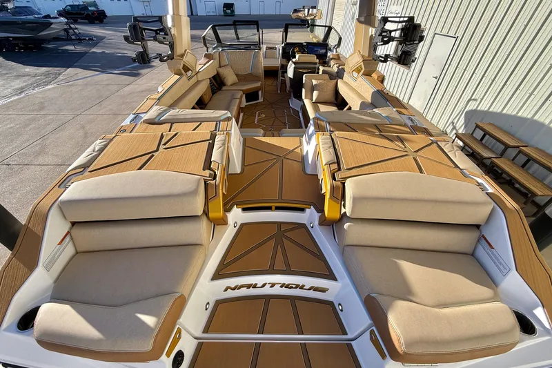 Slide: The Image of 2026 Nautique Super Air Nautique G25 Paragon interior with luxurious seating and modern design. - 8